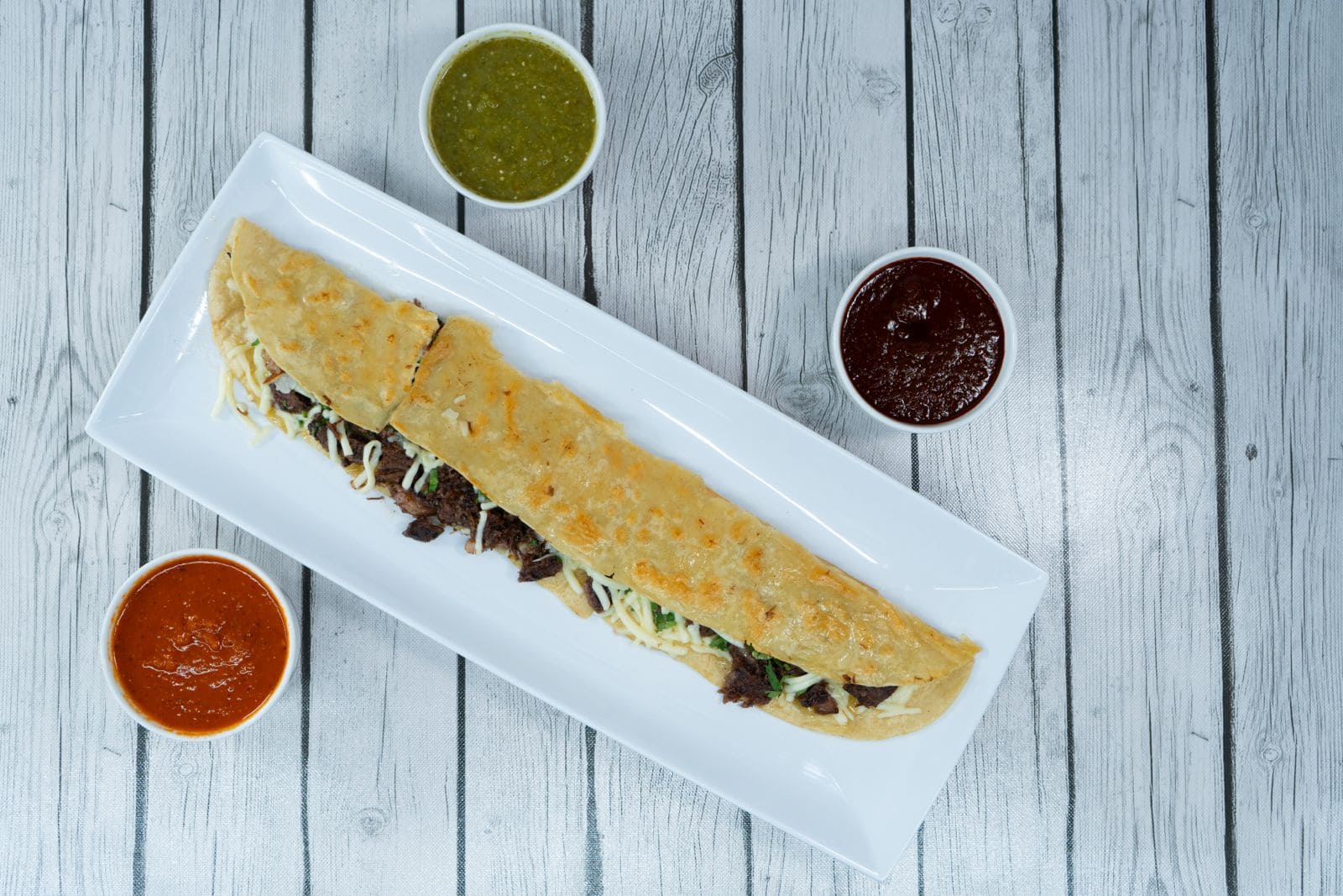 Machetes mexicanos en tortilla hecha a mano - Villas Pueblita Indianápolis